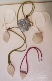 Click here for larger image. Pendants by Sol Zimmerdahl.